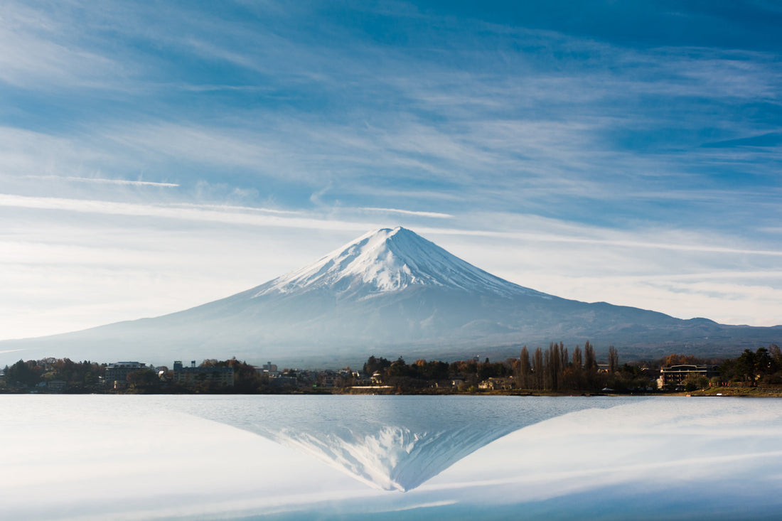 Mountain reflected in still lake symbolizing God's peace and the True Shepherd delivering His flock in Ezekiel