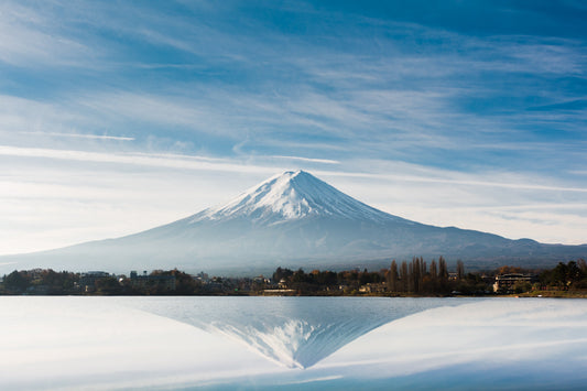 Mountain reflected in still lake symbolizing God's peace and the True Shepherd delivering His flock in Ezekiel