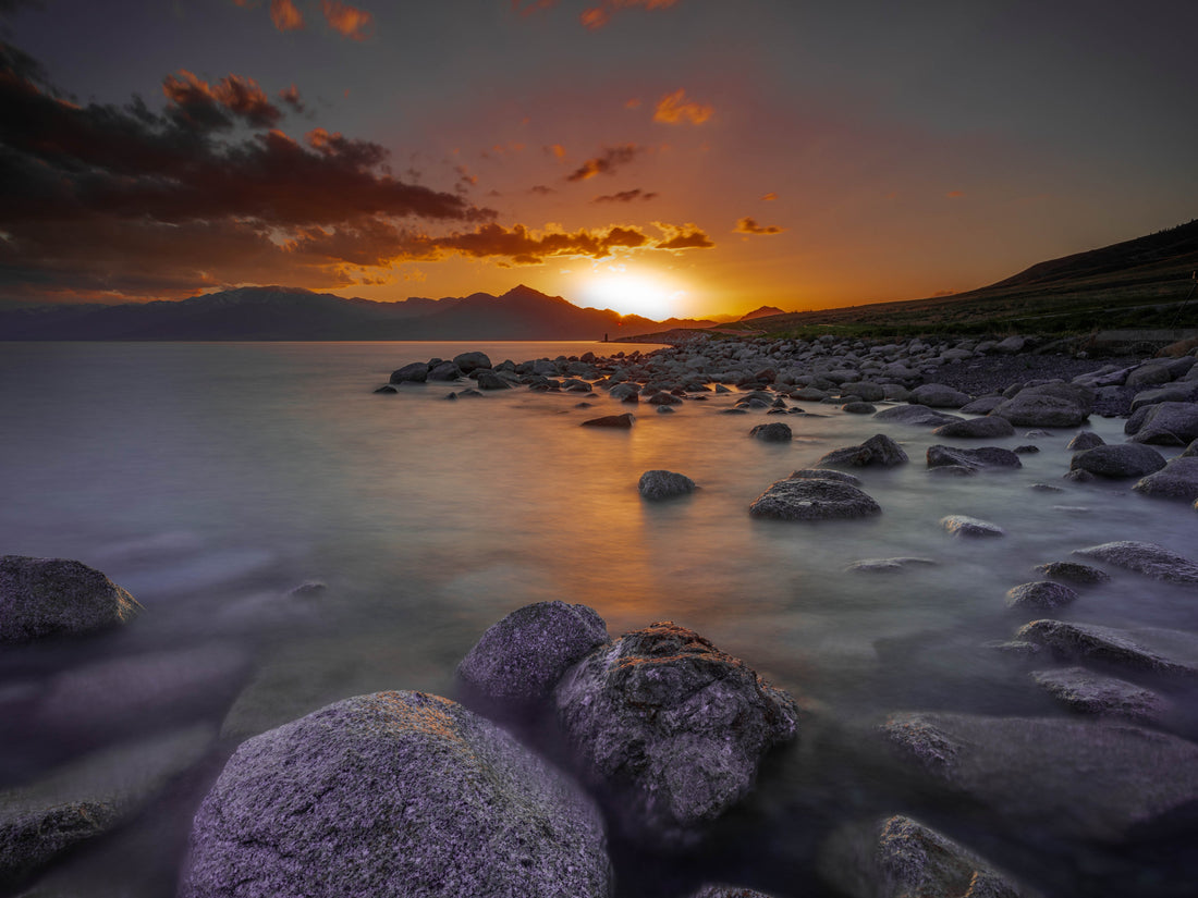 Sunset over still water depicting Jesus walking on the sea - Mark 6:46-52 miracle account
