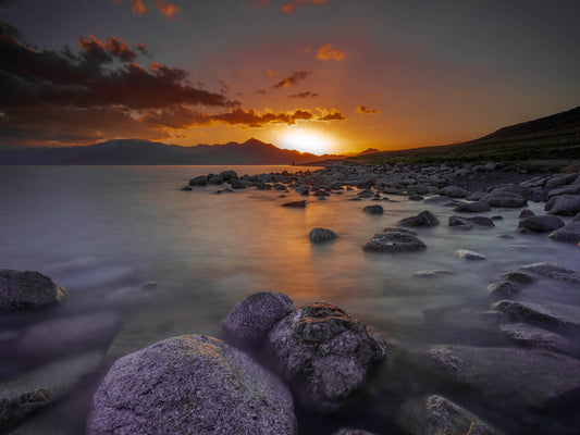 Sunset over still water depicting Jesus walking on the sea - Mark 6:46-52 miracle account